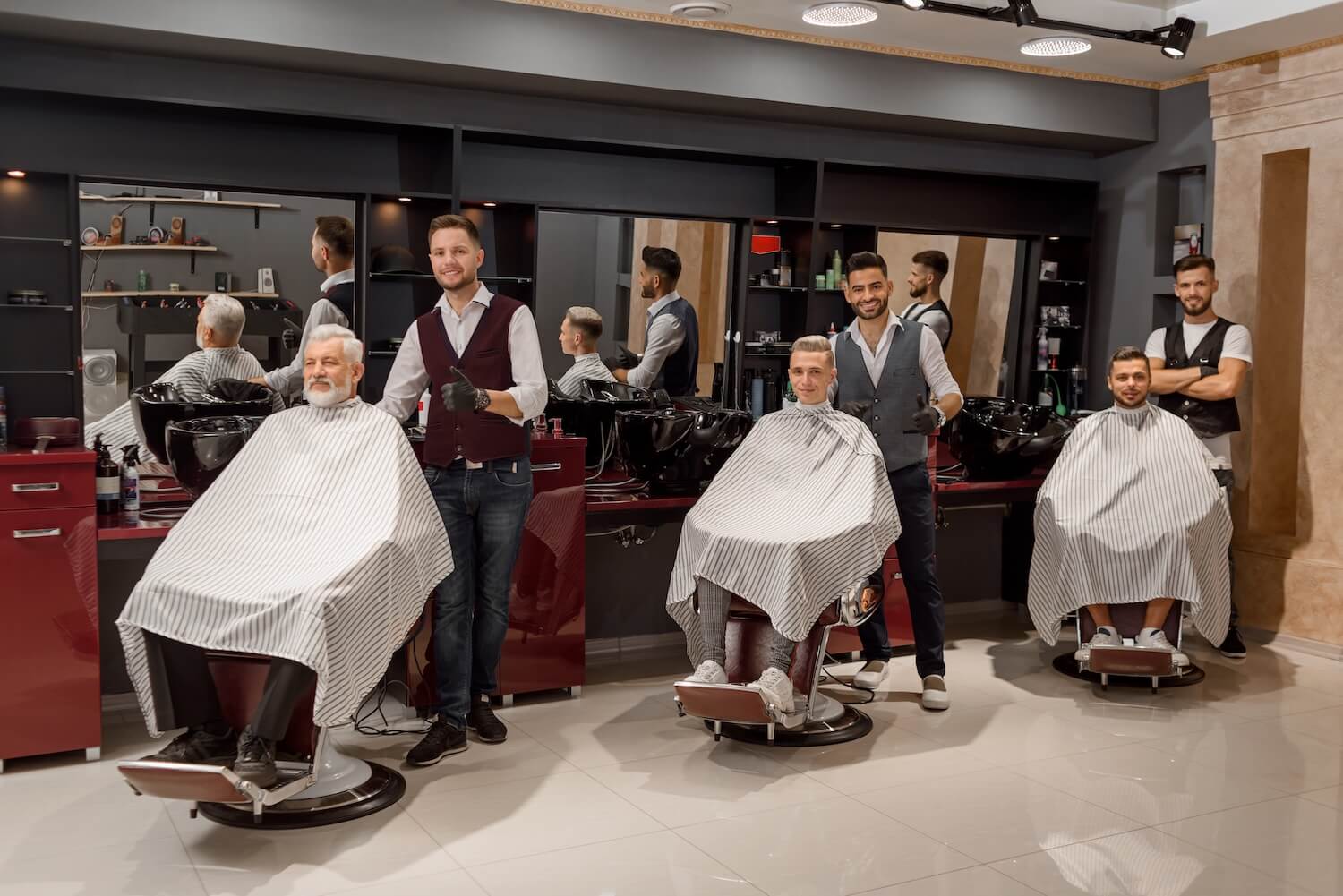 male-clients-sitting-in-hairdresser-chairs-covered-2025-03-26-03-55-58-utc-2.jpg